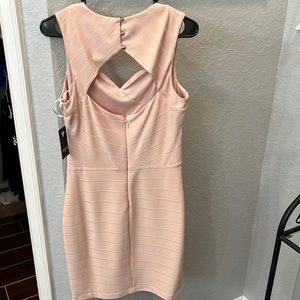 NWT. GUESS Bodycon dress. Never worn.